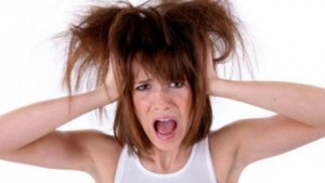 woman gasping because of dry hair