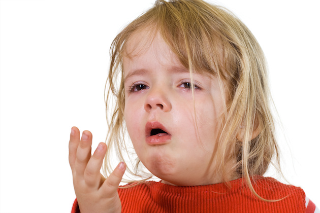 little girl coughing Little girl coughing with the flu