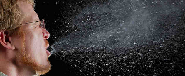 man-coughing-spray man coughing a spray of visible flem in motion