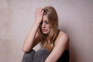 tear-stained young woman