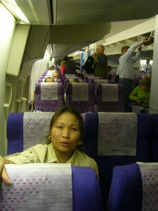 woman sitting aeroplane passenger seat